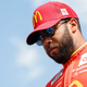 Bubba Wallace, driver of the #45 McDonald’s Toyota, walks onstage during driver intros prior to the NASCAR Cup Series South Point 400 at Las Vegas Motor Speedway on October 16, 2022 in Las Vegas, Nevada. (Photo by Sean Gardner/Getty Images)